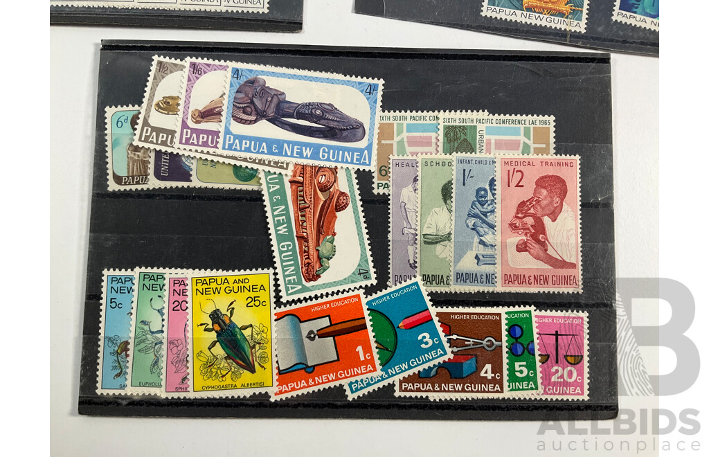 Collection of Papua New Guinea 1960's/70's Mint Stamp Sets, Album of Australian First Day Covers Spanning 1976 to 1979 and Collection of Vintage European Coins