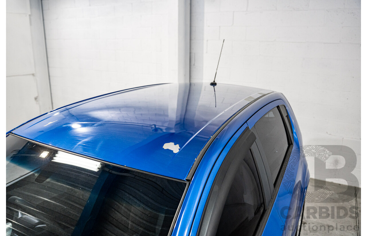 9/2012 Holden Barina TM 5d Hatchback Bocaray Blue Metallic 1.6L