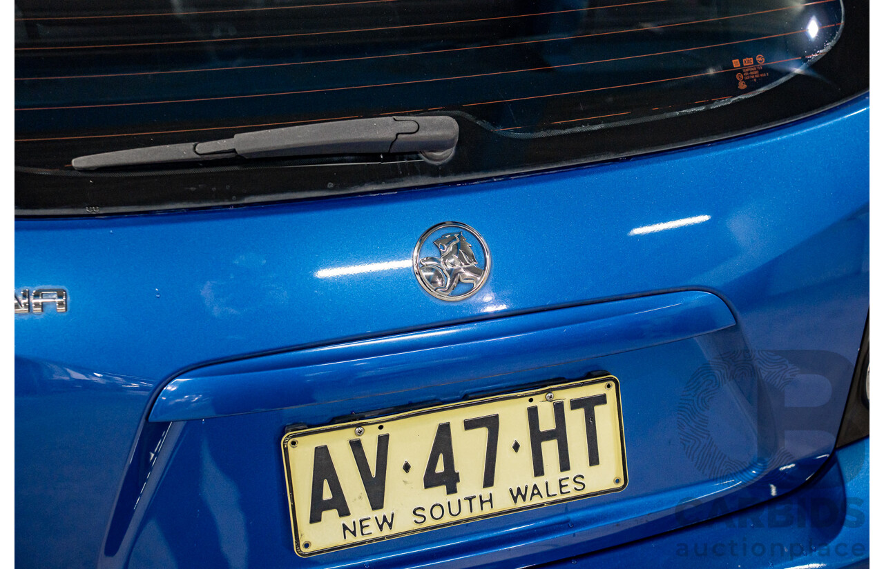 9/2012 Holden Barina TM 5d Hatchback Bocaray Blue Metallic 1.6L
