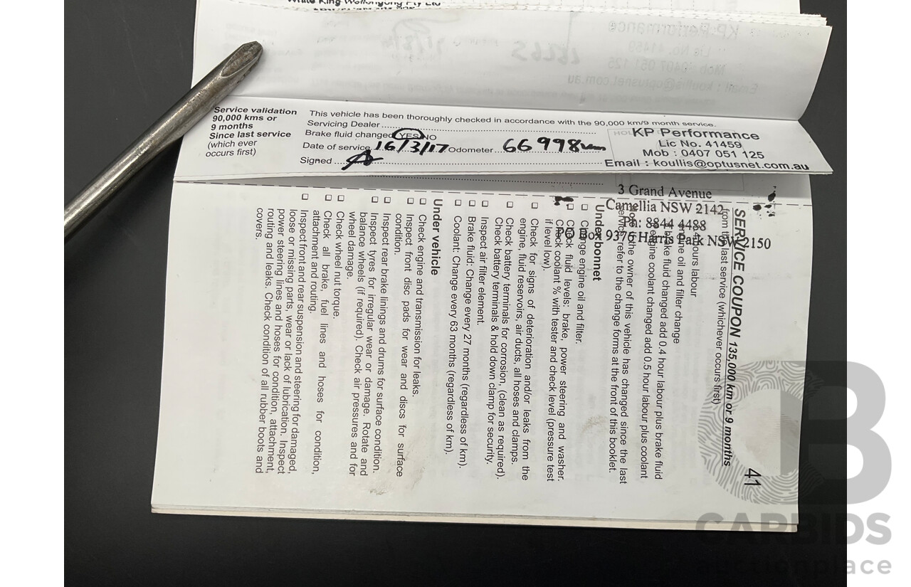 9/2012 Holden Barina TM 5d Hatchback Bocaray Blue Metallic 1.6L