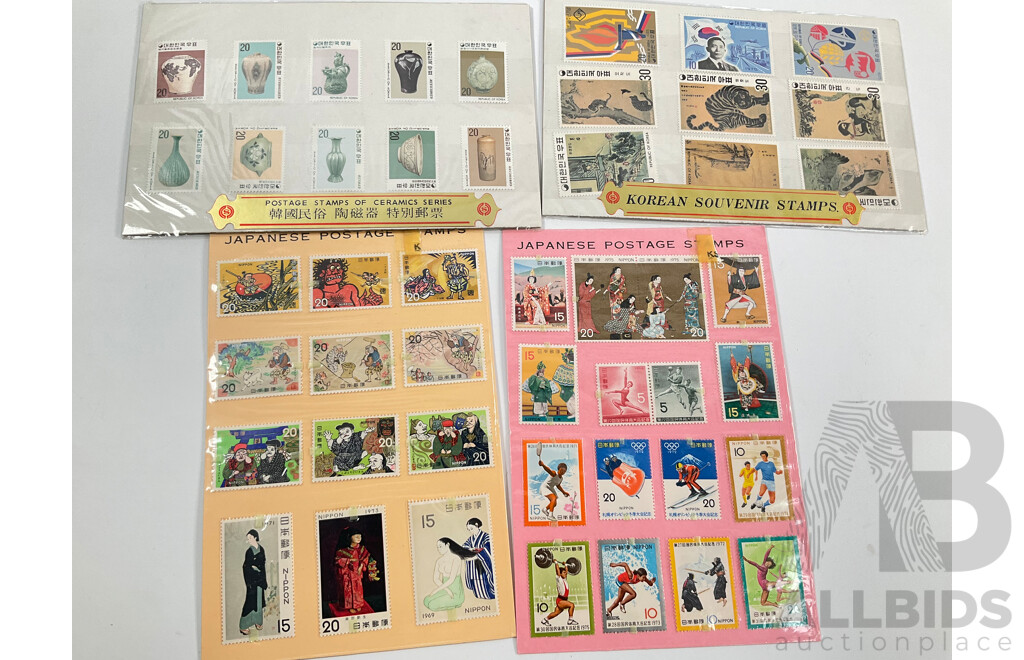Collection of International Mint and Cancelled Stamps and Stamp Packs Including Papaua New Guinea, Japan, Korea, Canada