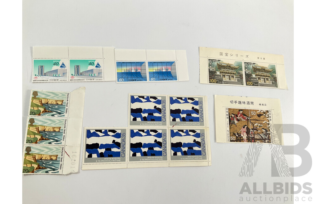 Collection of International Mint and Cancelled Stamps and Stamp Packs Including Papaua New Guinea, Japan, Korea, Canada