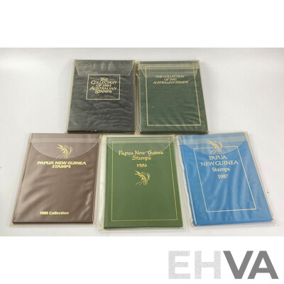 Two Australian Annual Stamp Albums 1984 and 1985 - Face Value $49 with Three Papua New Guinea Albums 1985, 1986, 1987