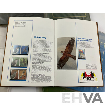 Two Australian Annual Stamp Albums 1984 and 1985 - Face Value $49 with Three Papua New Guinea Albums 1985, 1986, 1987