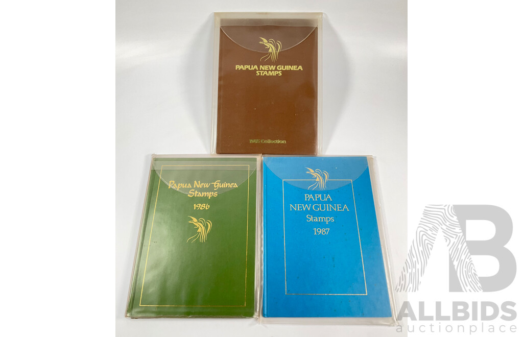 Three Papua New Guinea Annual Stamp Albums 1985, 1986, 1987