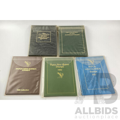 Two Australian Annual Stamp Albums 1984 and 1985 - Face Value $49 with Three Papua New Guinea Albums 1985, 1986, 1987