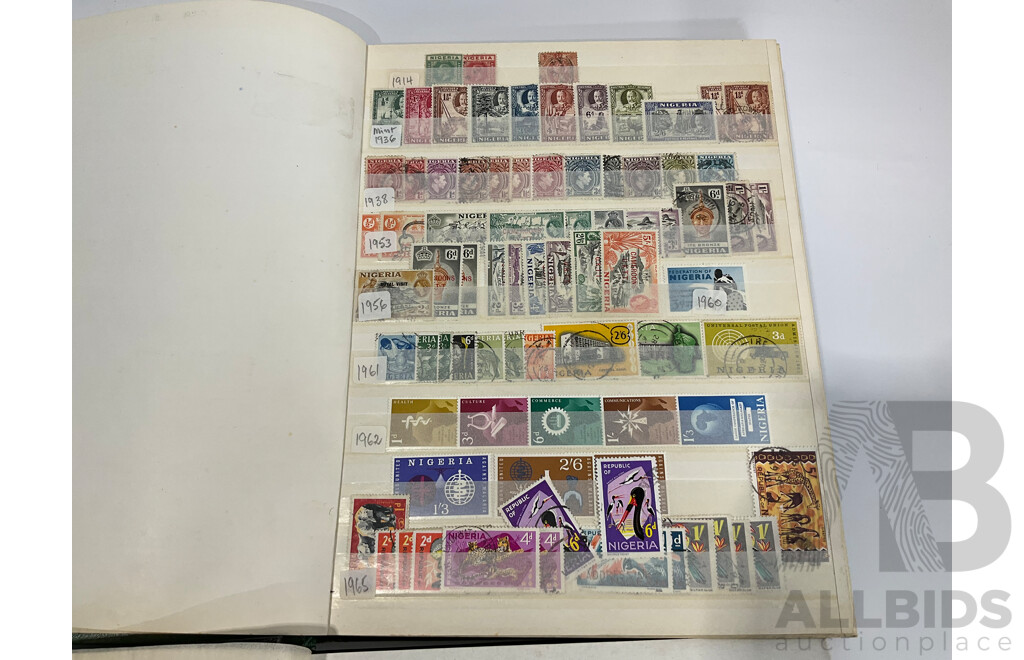 Two Albums of Antique and Vintage International Mint and Cancelled Stamps Including Zanzibar Nigeria, Guernsey, Zimbabwe, Zaire, Uruguay, Paraguay, Mexico, Brazil, Guyana, Colombia and More