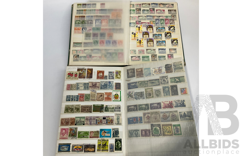 Two Albums of Antique and Vintage International Mint and Cancelled Stamps Including Zanzibar Nigeria, Guernsey, Zimbabwe, Zaire, Uruguay, Paraguay, Mexico, Brazil, Guyana, Colombia and More