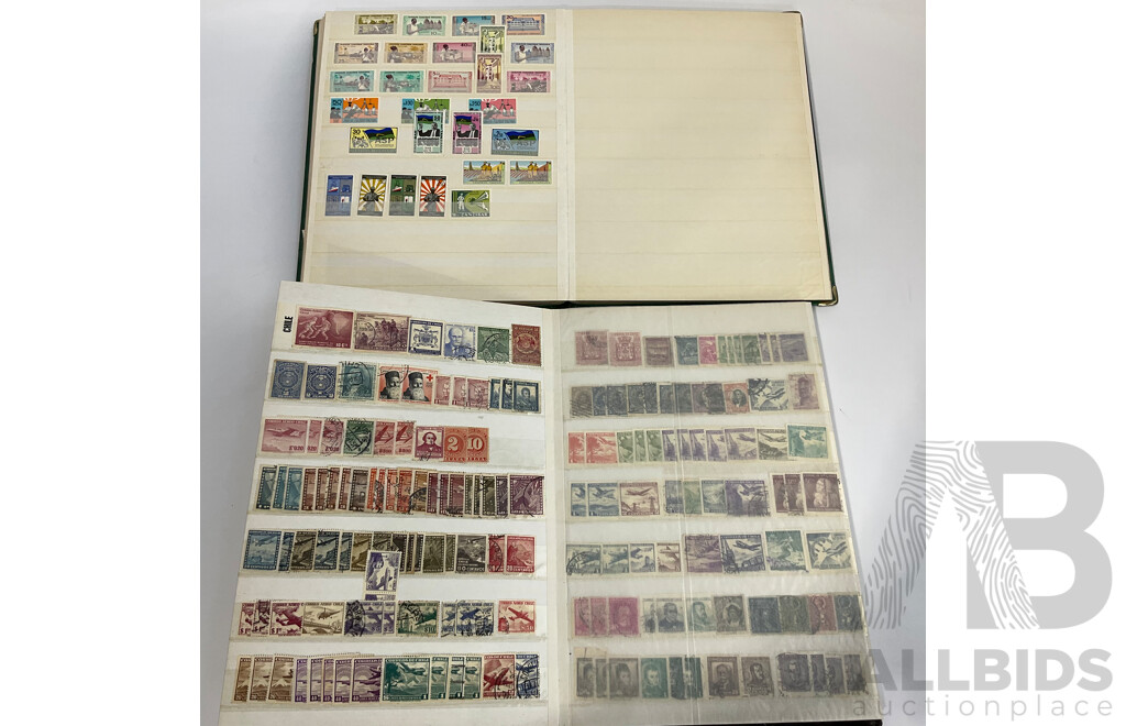 Two Albums of Antique and Vintage International Mint and Cancelled Stamps Including Zanzibar Nigeria, Guernsey, Zimbabwe, Zaire, Uruguay, Paraguay, Mexico, Brazil, Guyana, Colombia and More