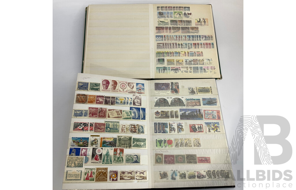 Two Albums of Antique and Vintage International Mint and Cancelled Stamps Including Zanzibar Nigeria, Guernsey, Zimbabwe, Zaire, Uruguay, Paraguay, Mexico, Brazil, Guyana, Colombia and More