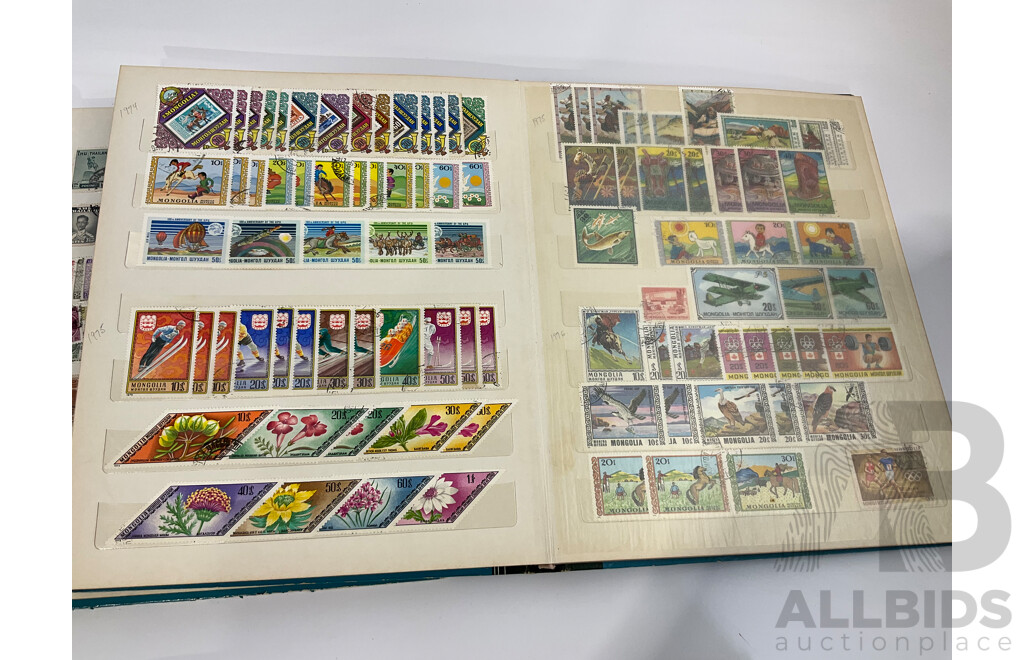 Three Albums of Vintage Cancelled and Mint Stamps Including Australia, Liberia, Mongolia, Thailand, Spain