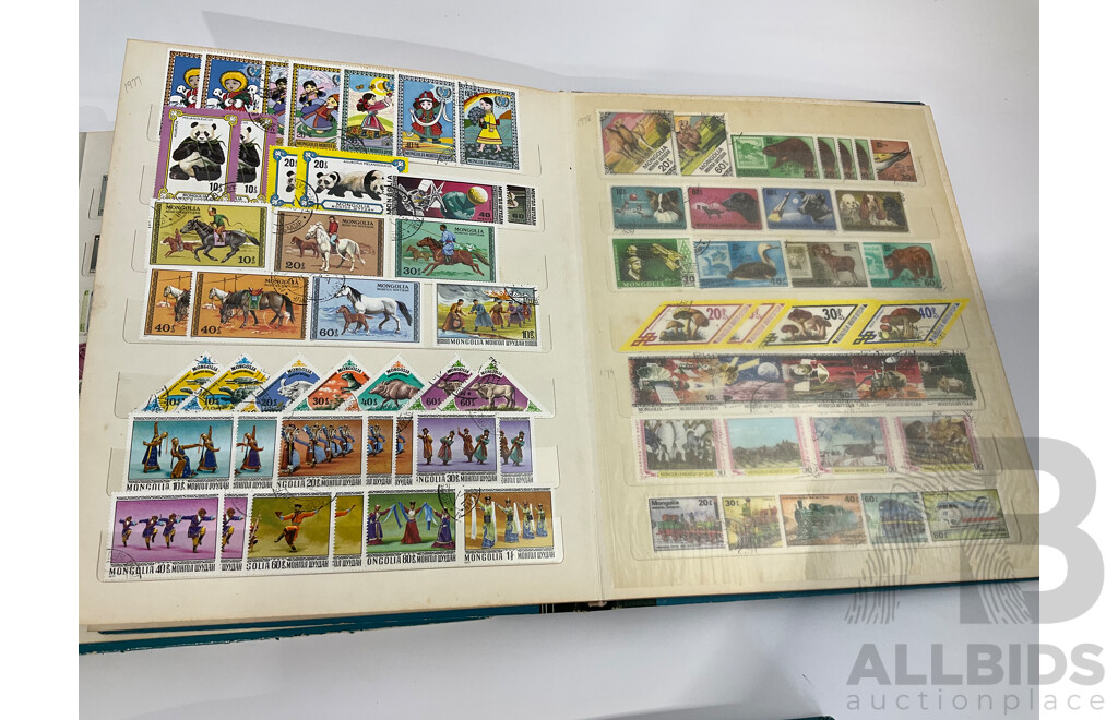 Three Albums of Vintage Cancelled and Mint Stamps Including Australia, Liberia, Mongolia, Thailand, Spain