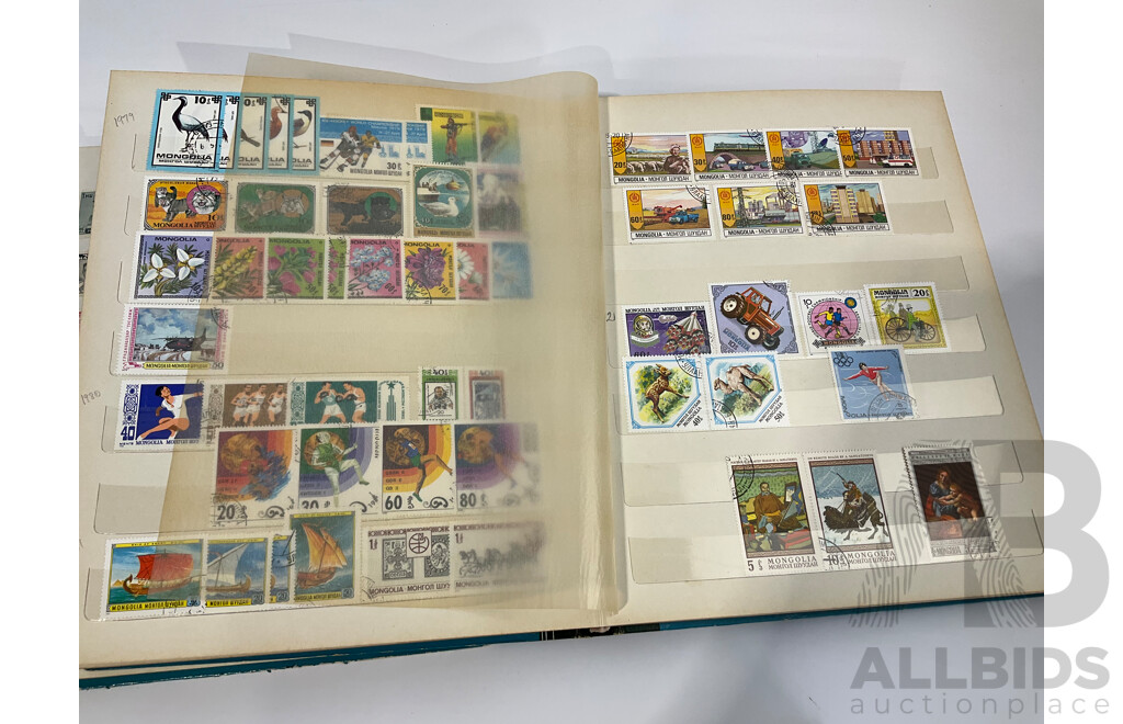 Three Albums of Vintage Cancelled and Mint Stamps Including Australia, Liberia, Mongolia, Thailand, Spain