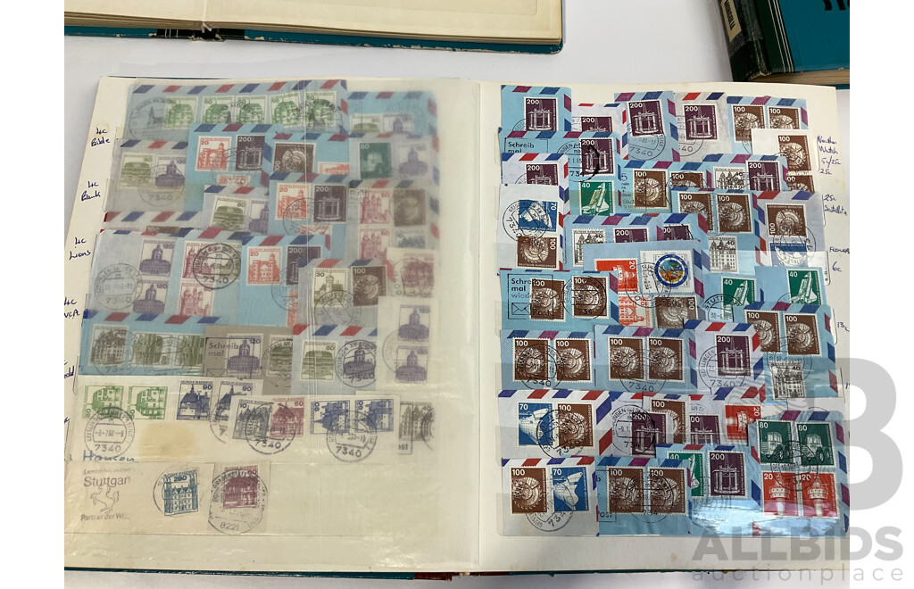 Three Albums of Vintage Cancelled and Mint Stamps Including Australia, Liberia, Mongolia, Thailand, Spain