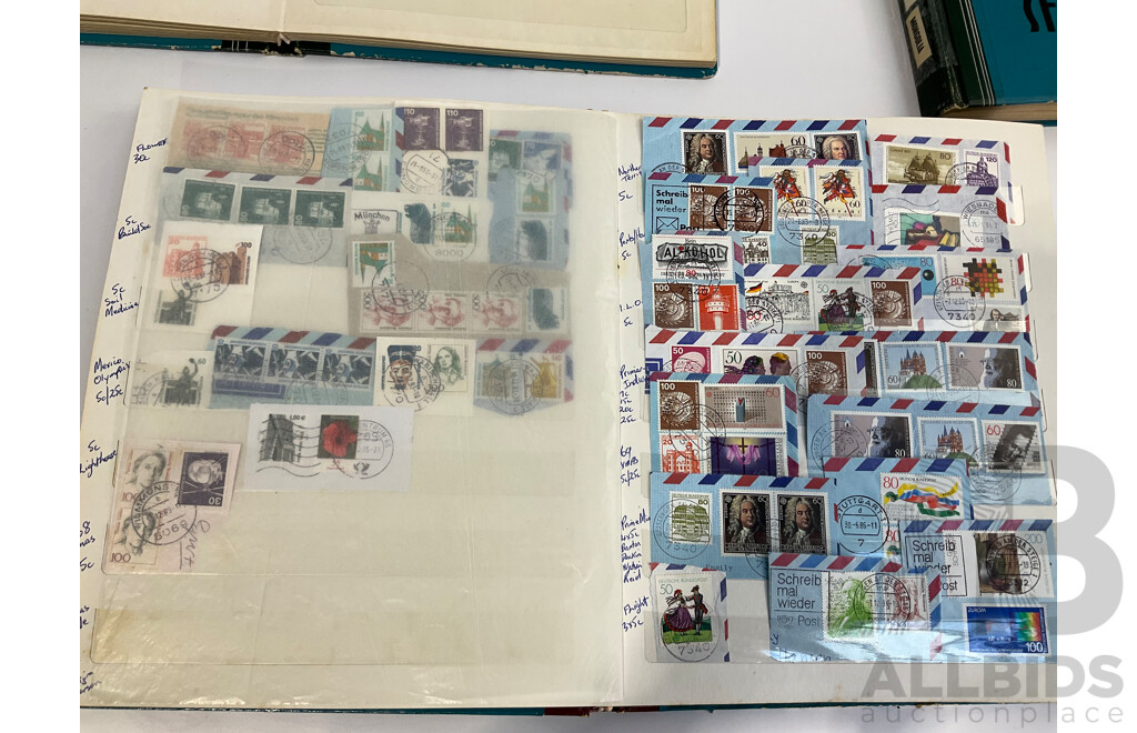 Three Albums of Vintage Cancelled and Mint Stamps Including Australia, Liberia, Mongolia, Thailand, Spain