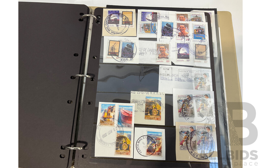 Six Albums of Cancelled Stamps and Prepaid Envelopes Including Australia, Iran, Israel, Spain, Singapore, Poland, Hong Kong