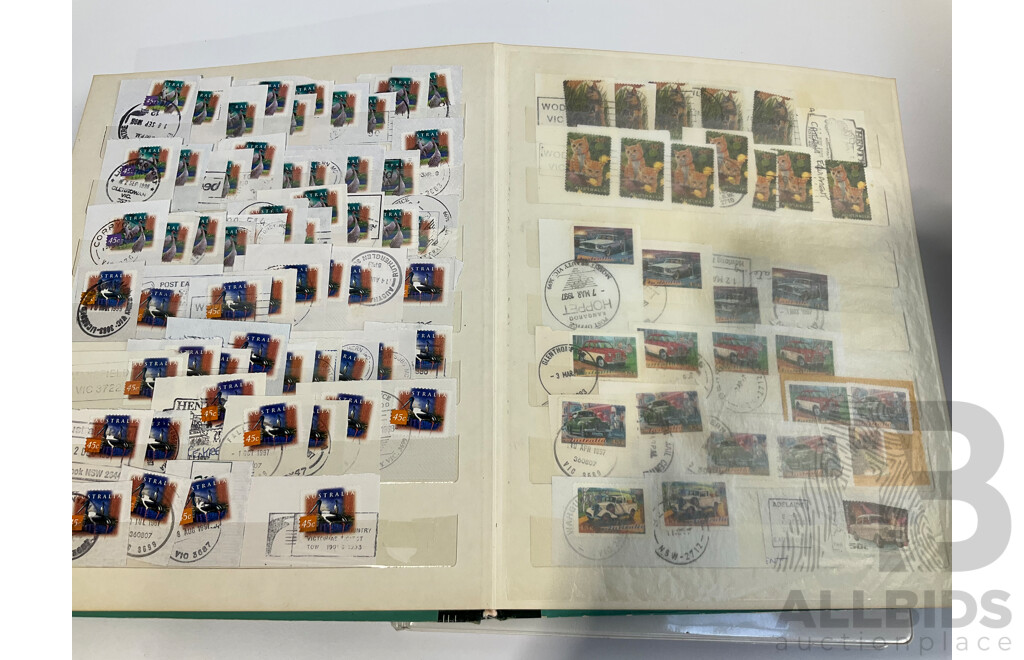 Six Albums of Cancelled Stamps and Prepaid Envelopes Including Australia, Iran, Israel, Spain, Singapore, Poland, Hong Kong