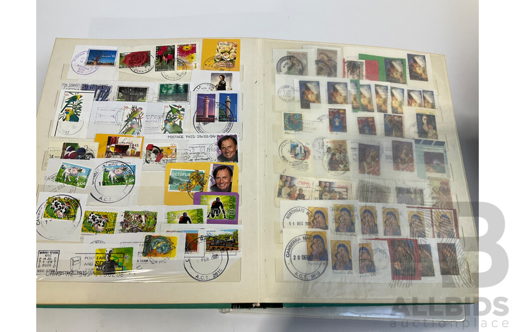 Six Albums of Cancelled Stamps and Prepaid Envelopes Including Australia, Iran, Israel, Spain, Singapore, Poland, Hong Kong