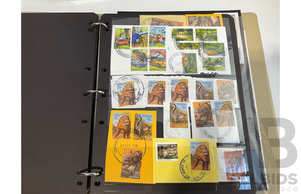 Six Albums of Cancelled Stamps and Prepaid Envelopes Including Australia, Iran, Israel, Spain, Singapore, Poland, Hong Kong