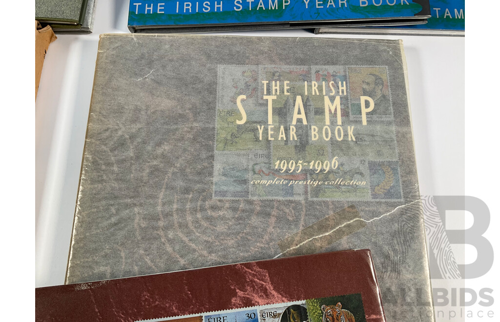 Eleven Irish Annual Stamp Albums Including 1989-1990, 1990-1991, 1990-1991 Special Edition, 1991-1992(2) 1994-1995, 1995-1996, 1997, 1998, 1999, 2000