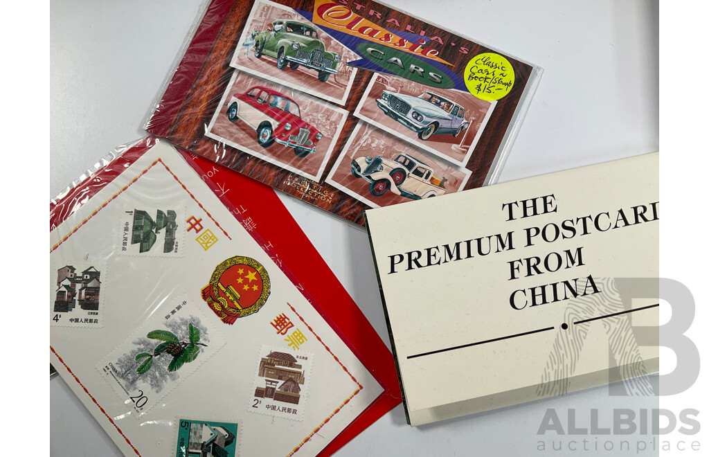 Collection of International Stamp Packs and First Day Covers Including United Stamps of All Nations Series, Australia, New Zealand, Hong Kong, China, Poland