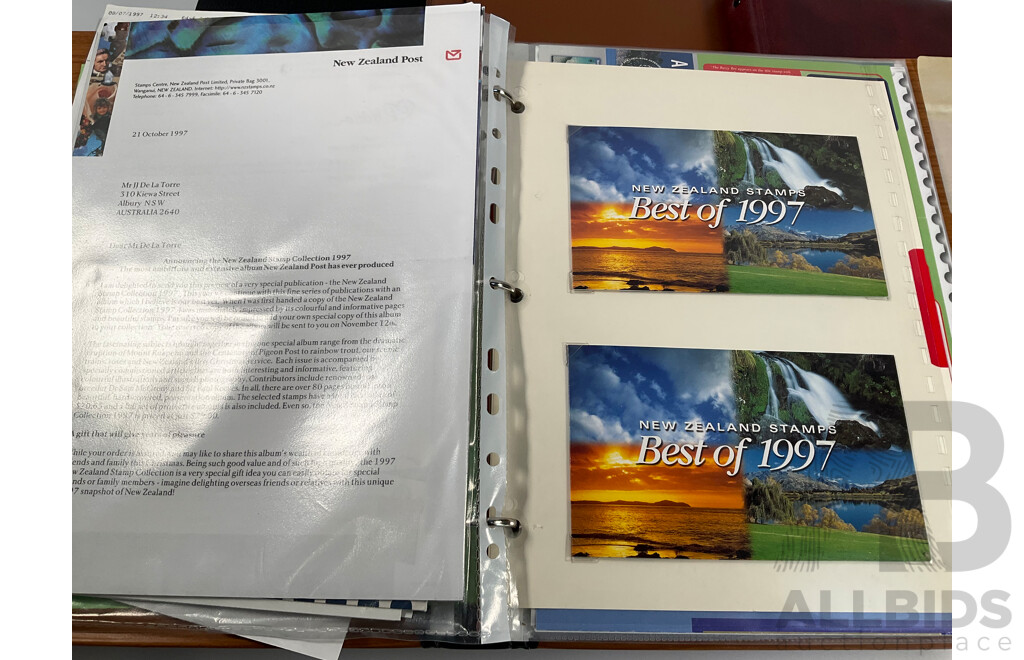Collection of International Stamp Packs and First Day Covers Including United Stamps of All Nations Series, Australia, New Zealand, Hong Kong, China, Poland