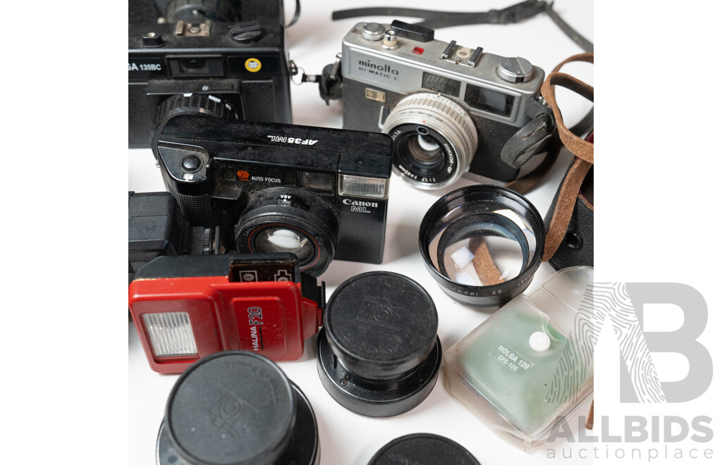 Vintage Cameras, Lenses and Flashes Including Canon ML, Minolta Hi-Matic E, Diana F, Holga 135BC