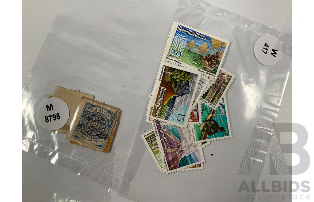 Collection of Vintage and Antique Stamps Including New Zealand, Papua New Guinea, Samoa Jamaica