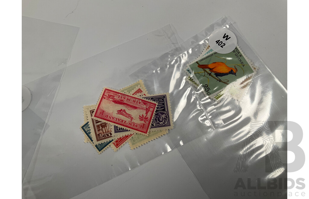 Collection of Vintage and Antique Stamps Including New Zealand, Papua New Guinea, Samoa Jamaica