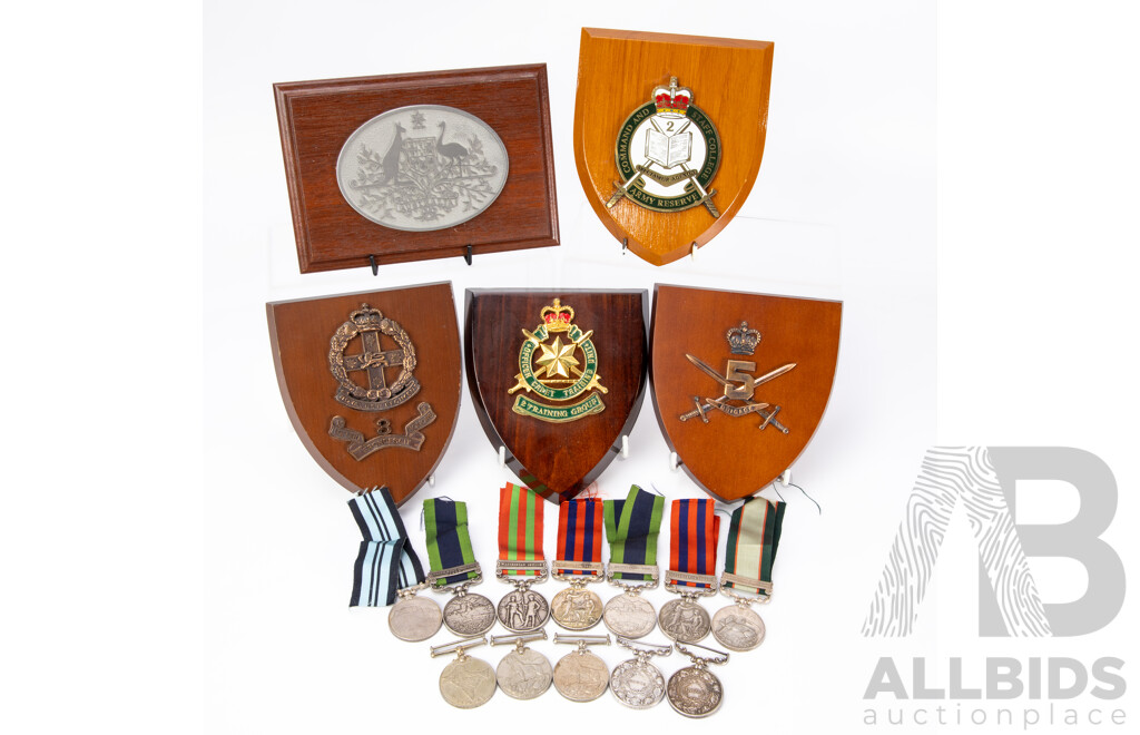 Collection of Five Army Related Wooden Wall Plaques Including One Australian Coat of Arms; and Approx Twelve Varied Military Related Medals (17)