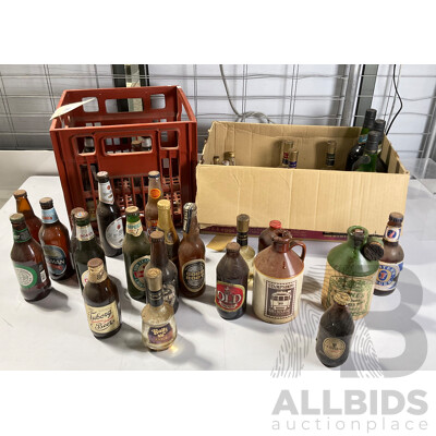 Collection of Vintage Beer and Liquor Bottles Including Brisbane Bitter, Old Ballarat Brew, Guinness Throw Down, Ceramic Stones Ginger Wine and More