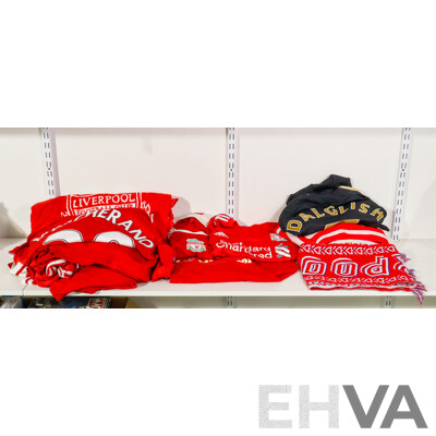Collection of Official Liverpool Football Club Supporter Gear Including Jerseys, Scarves and Towels