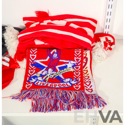 Collection of Official Liverpool Football Club Supporter Gear Including Jerseys, Scarves and Towels