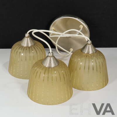 Retro Ceiling Light Fixture Featuring Three Pendant Lights with Caramel-tinted Glass Shades