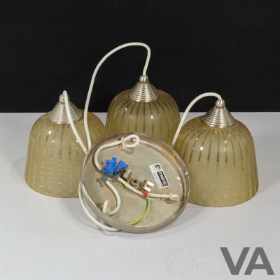 Retro Ceiling Light Fixture Featuring Three Pendant Lights with Caramel-tinted Glass Shades