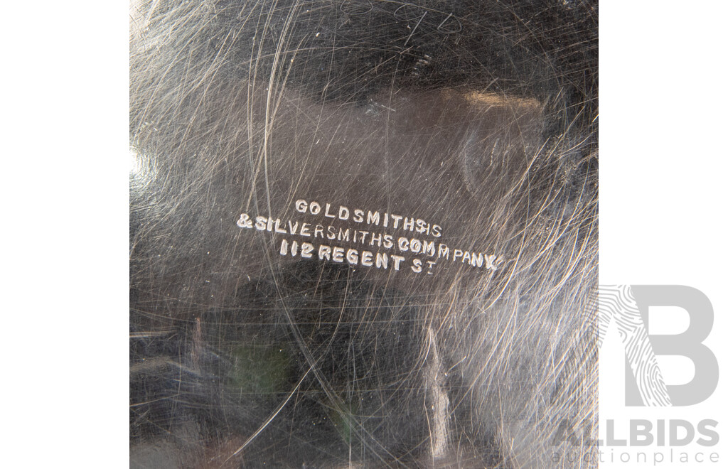 Pair of Repoussé William Comyns Sterling Silver Bottle Coasters, London, C.1893