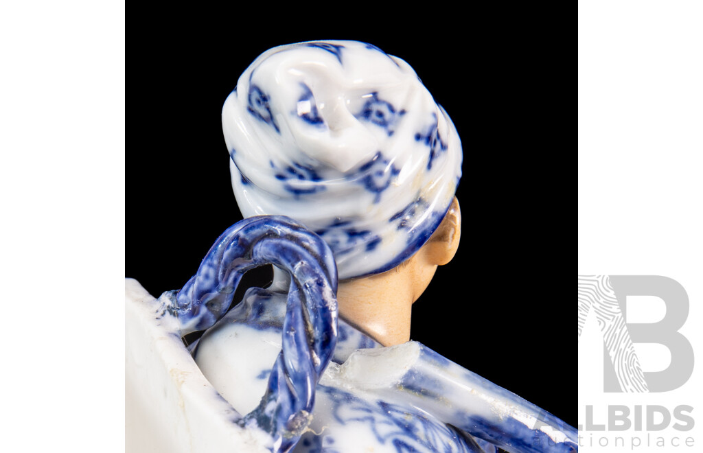 Blue Chinese Porcelain Merchant Figurine