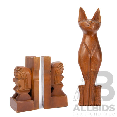 Collection Of Teak Items Pair Of 1980s Maori Tiki Carved Bookends And A Hand Carved Cat