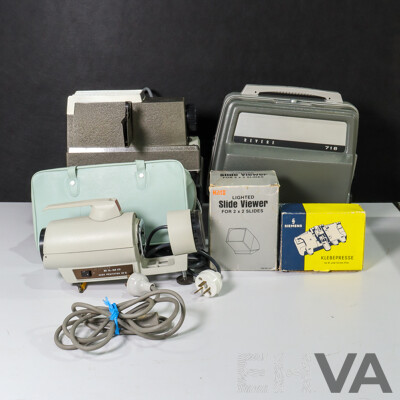 Collection of Vintage Movie Equipment Including Revere 718 8mm Film Projector, Bell & Howell Slide Projector,  Siemens Film Splicer, Lighted Slide Viewer and Elmo Slide Projectior