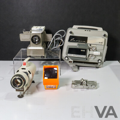 Collection of Vintage Movie Equipment Including Revere 718 8mm Film Projector, Bell & Howell Slide Projector, Siemens Film Splicer, Lighted Slide Viewer and Elmo Slide Projectior