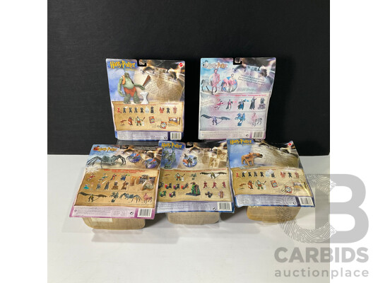 Collection of Five Harry Potter Figures in Original Packaging