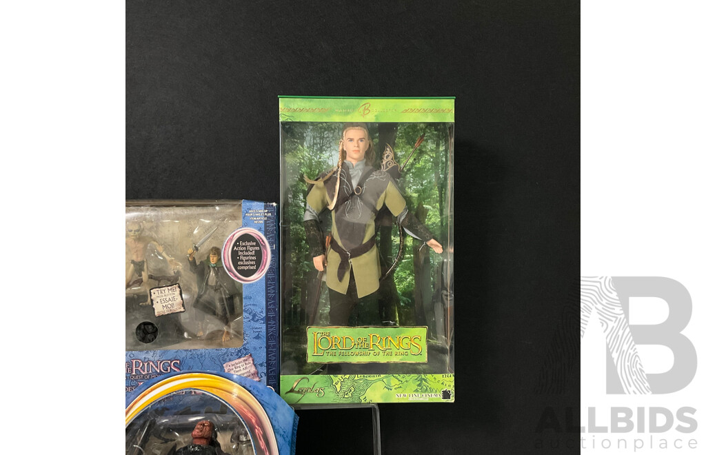 Collection of Five Lord of the Rings Figures in Original Packaging Including Special Edition Legolas and Arwen