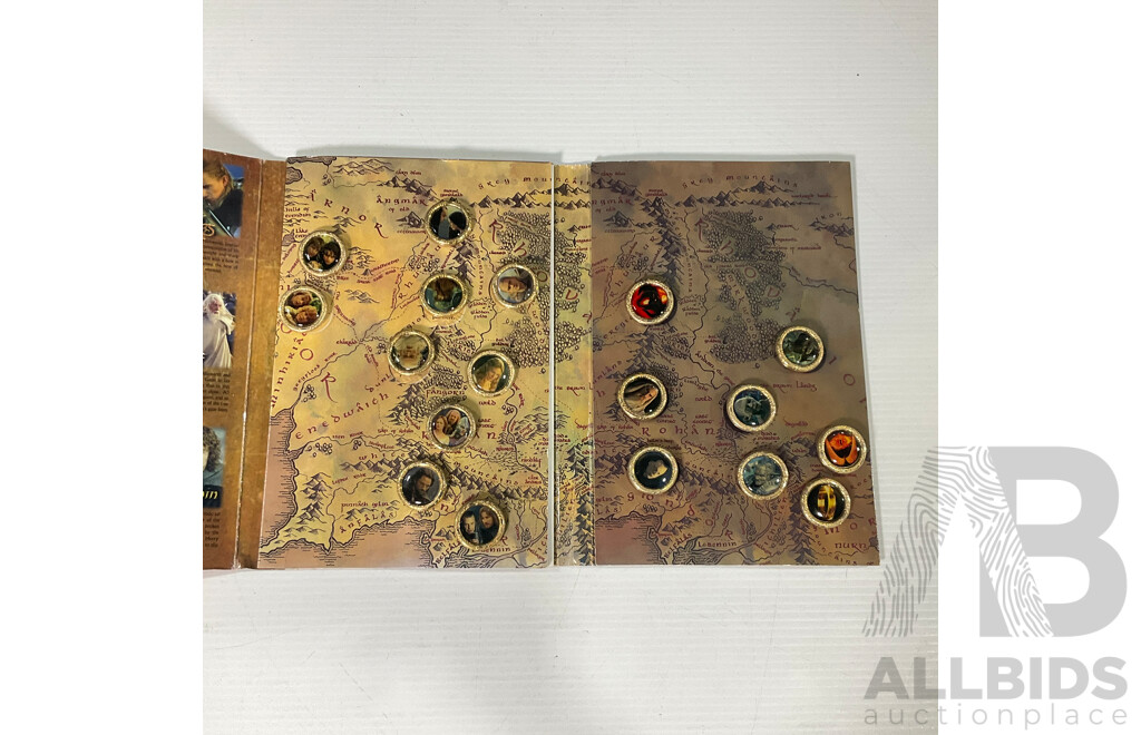 Collection of Lord of the Rings Paraphernalia in Original Packaging Including Pin Collection, Cards, Clock, Sticker Collection Book, Tin Container and More