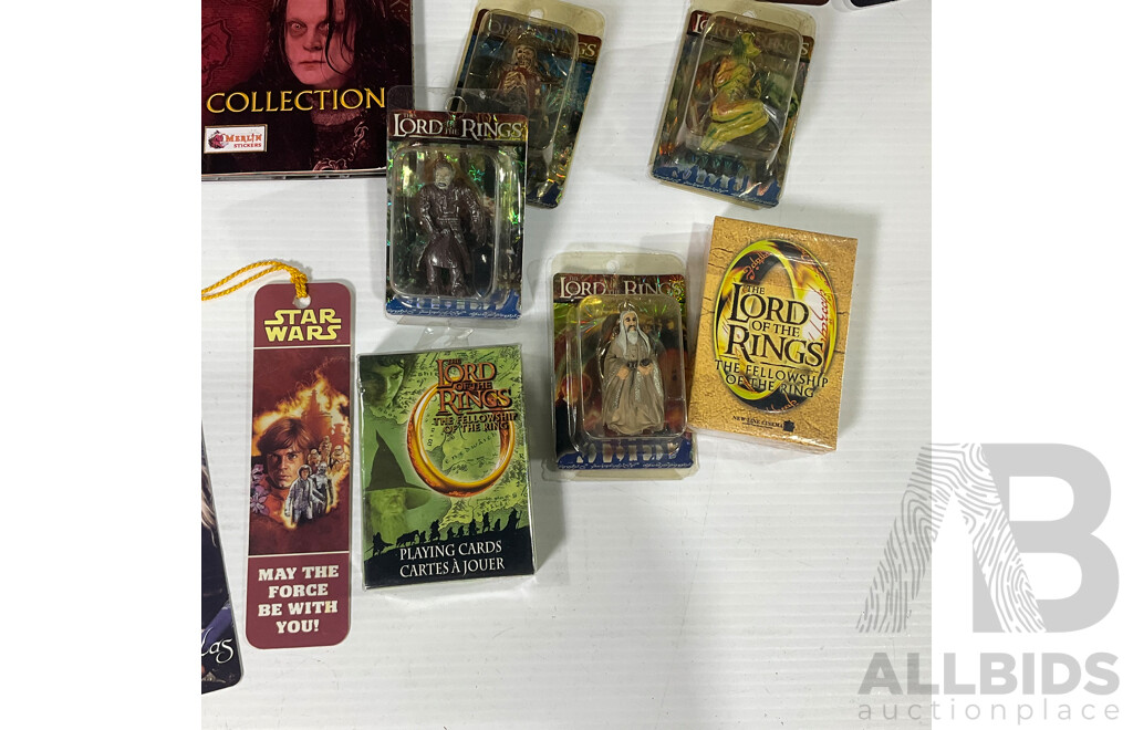 Collection of Lord of the Rings Paraphernalia in Original Packaging Including Pin Collection, Cards, Clock, Sticker Collection Book, Tin Container and More