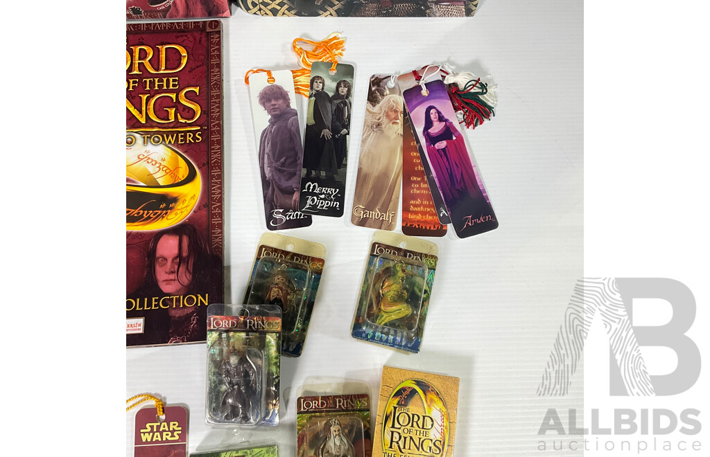 Collection of Lord of the Rings Paraphernalia in Original Packaging Including Pin Collection, Cards, Clock, Sticker Collection Book, Tin Container and More