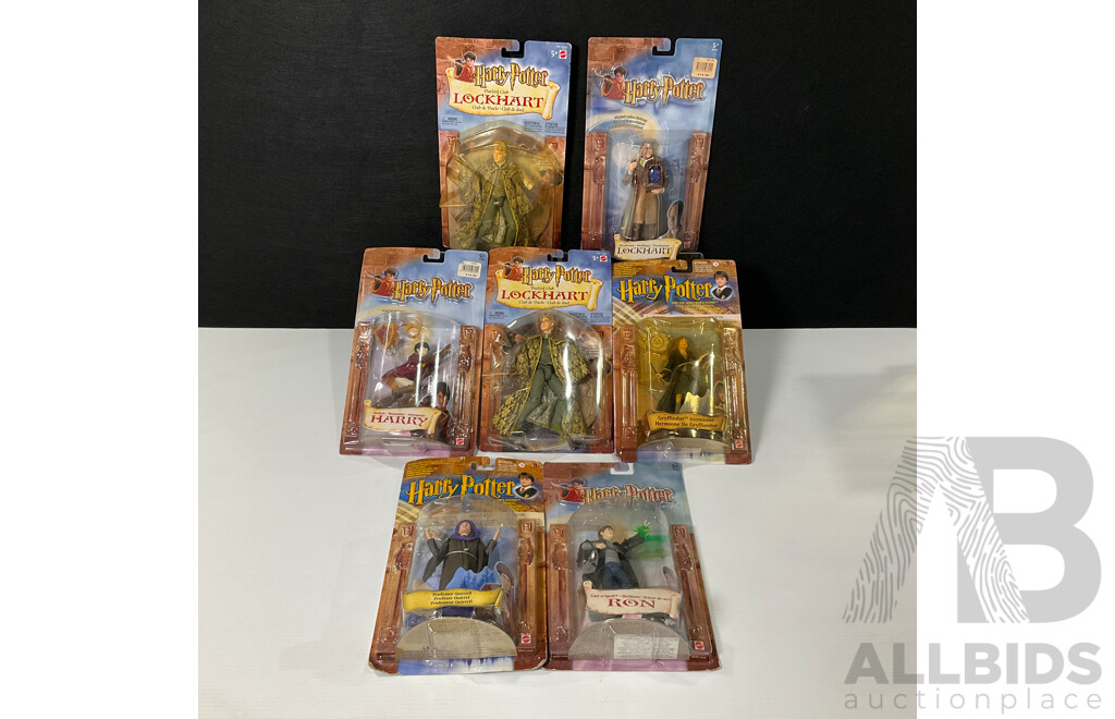 Collection of Seven Harry Potter Figures in Original Packaging
