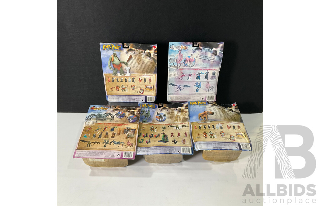 Collection of Five Harry Potter Figures in Original Packaging