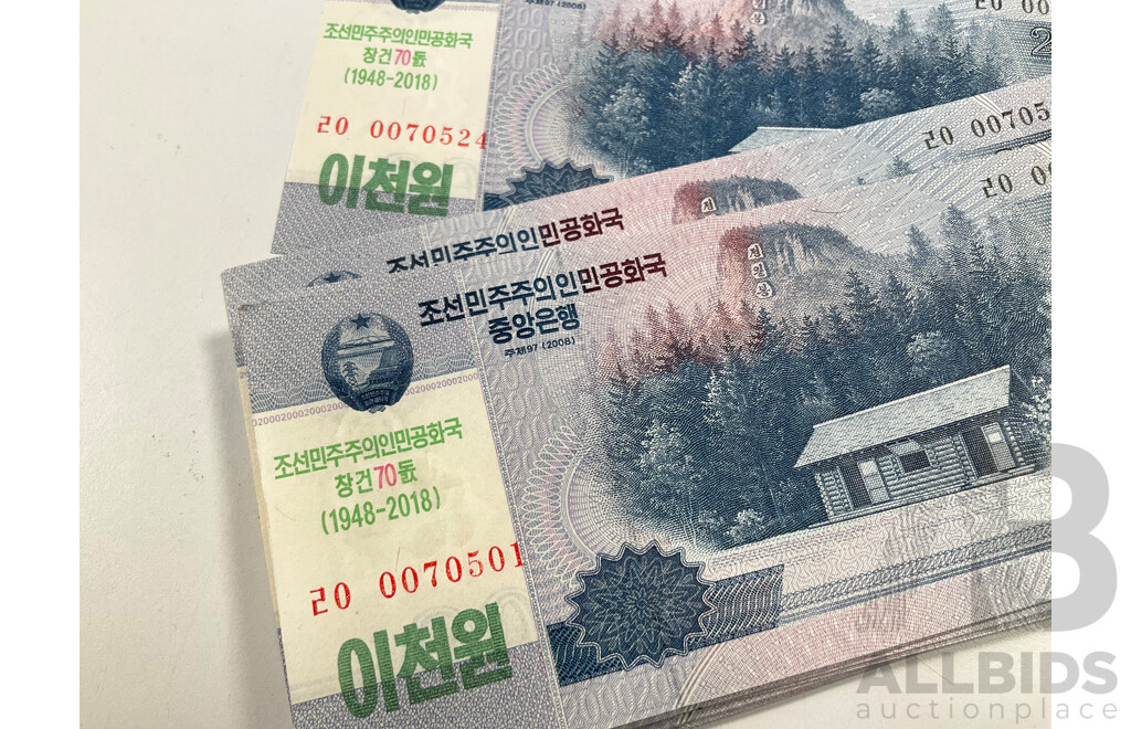 Twenty Four North Korean UNC Two Thousand Won Banknotes, 70th Anniversary of the DPRK, Consecutive 20 0070501 - 20 0070524