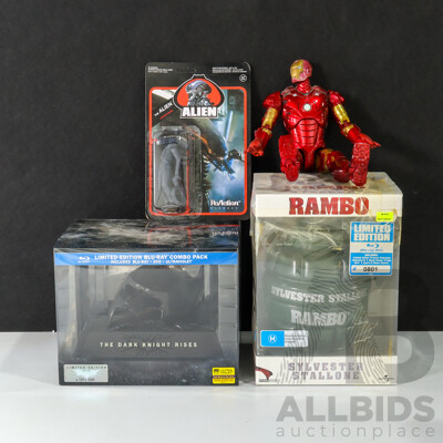 Collection of Limited Edition  Movie Paraphilia Including Batman Mask and Movie Set, Rambo Grenade, the Alien and Iron Man Figurines
