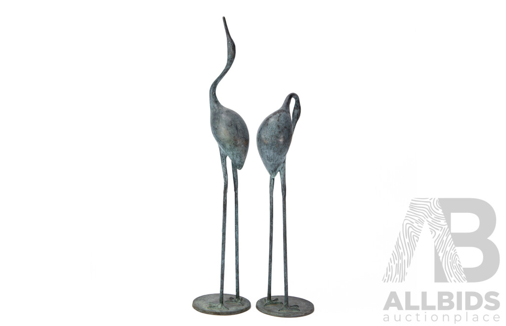 Pair of Cast Metal Stalk Figures